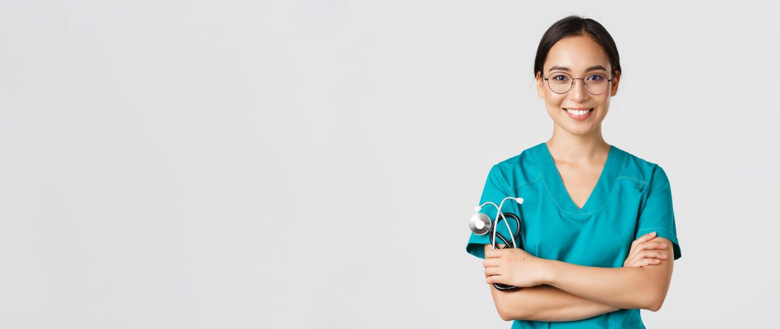 covid-19-coronavirus-disease-healthcare-workers-concept-close-up-confident-professional-female-doctor-nurse-glasses-scrubs-standing-white-background-cross-arms